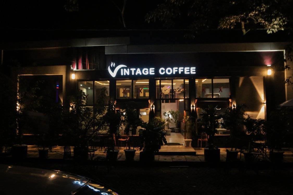 Vintage Coffee: clear, professional exterior night shot