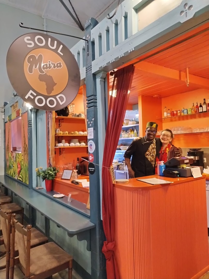 Maira: welcoming staff and restaurant interior