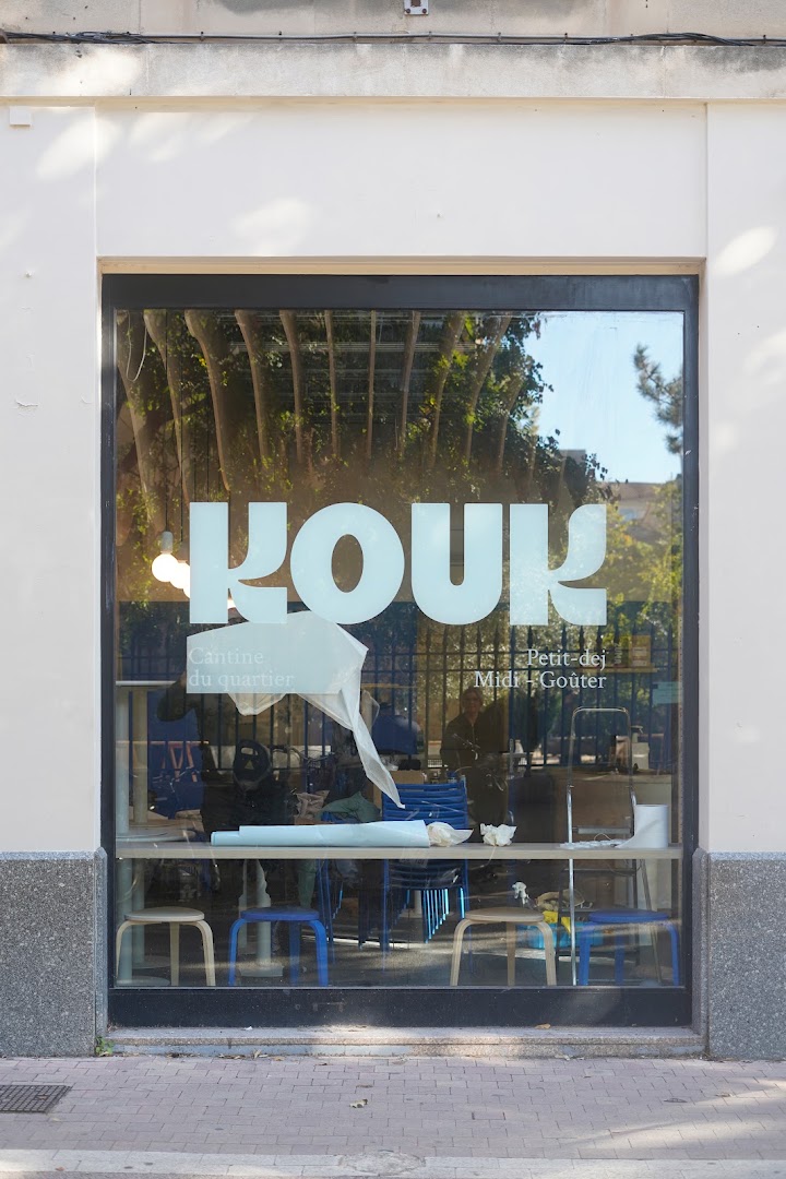 Kouk: clear storefront photo showing venue