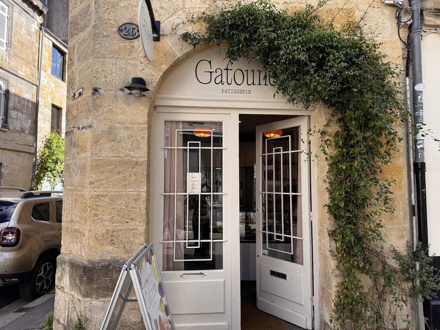 Gatoune: clear, inviting exterior storefront photo