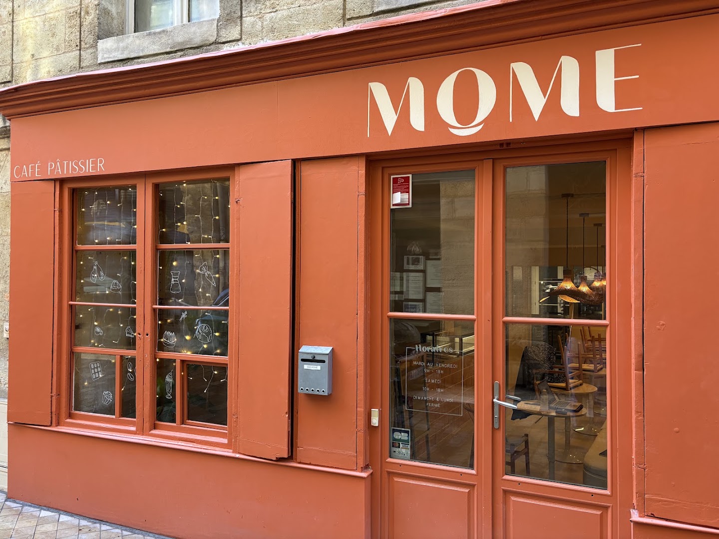 MOME: clear, professional exterior shot