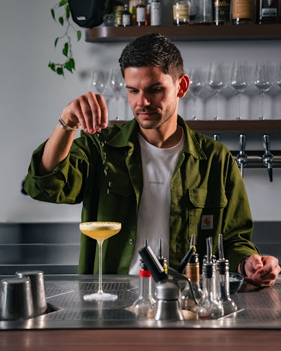 Contrast: professional high-quality bartender action shot