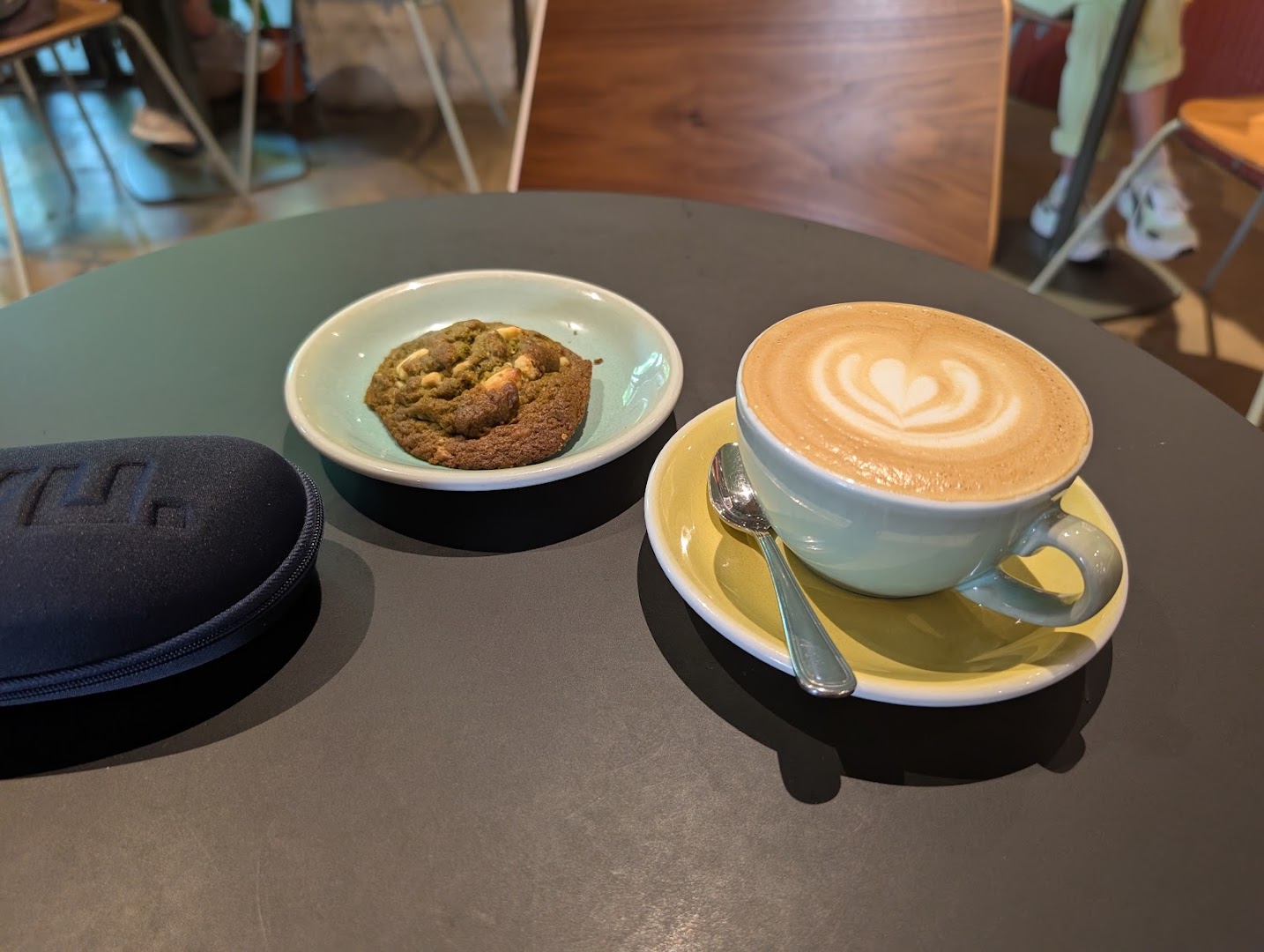 Madeleine Café: appetizing photo of coffee and cookie
