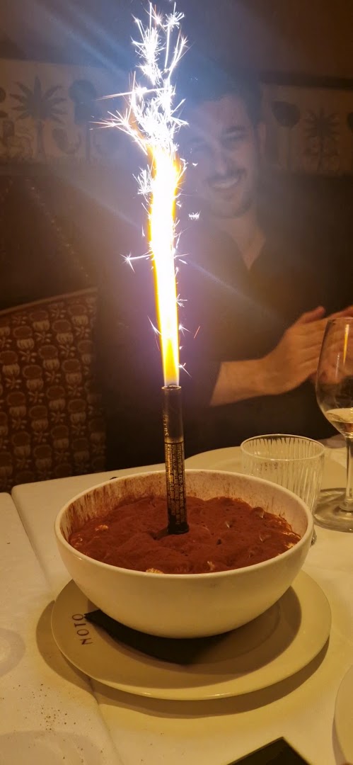 Noto: celebratory atmosphere with restaurant branding