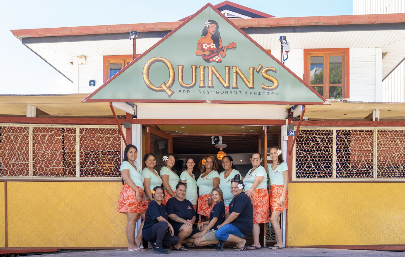Quinn's: professional staff photo at entrance