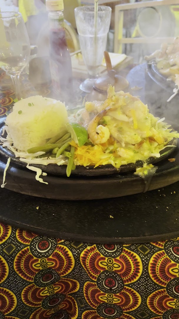 African Queen Restaurant: appetizing photo of served dish