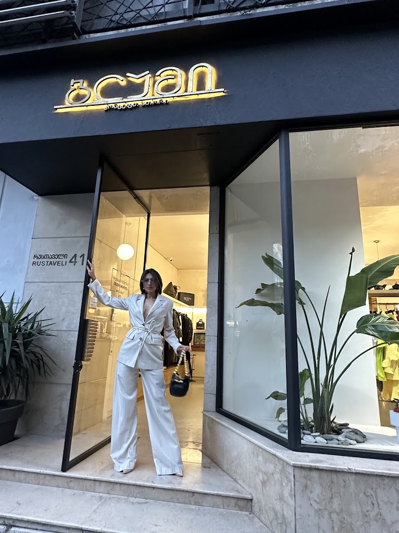 Bloom Concept Store: professional storefront photo with customer