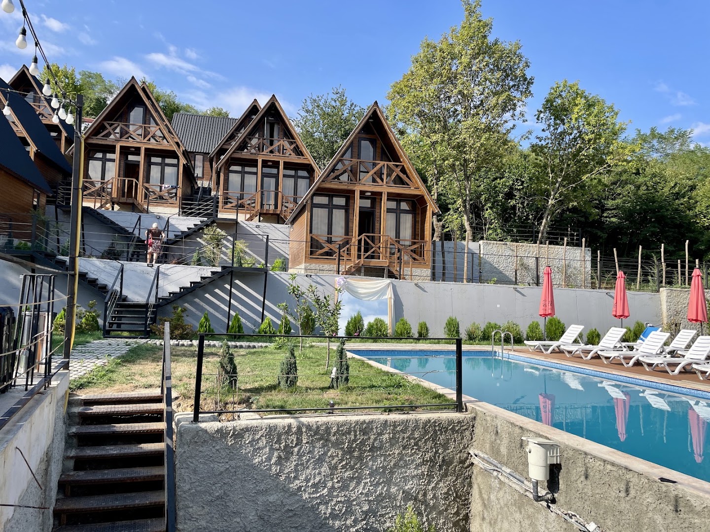 Beyond the Nine Mountains: attractive venue exterior and pool