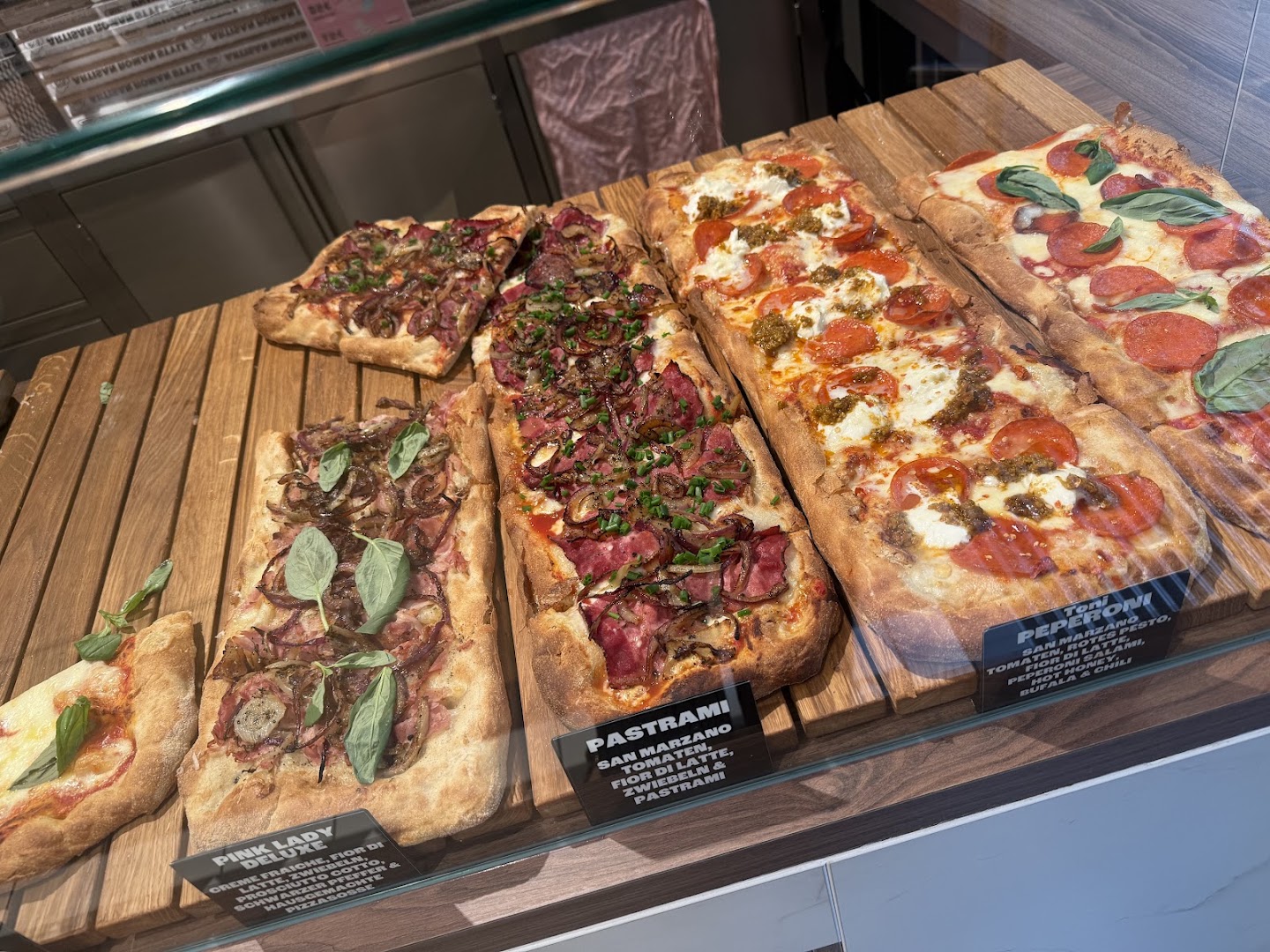 Pizza Wolke: appetizing display of fresh pizza