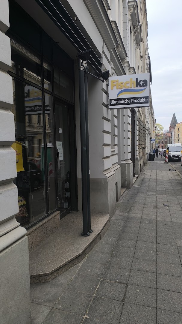 Fischka: clear storefront photo showing signage