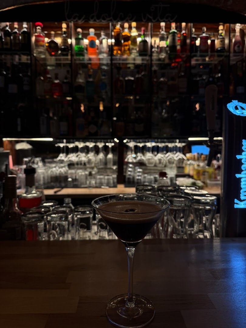 NOVA: atmospheric bar shot with drink