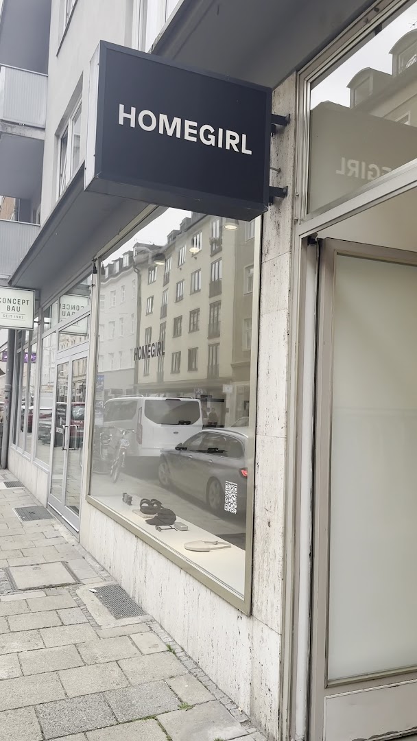 Homegirl Space: clear storefront photo showing branding