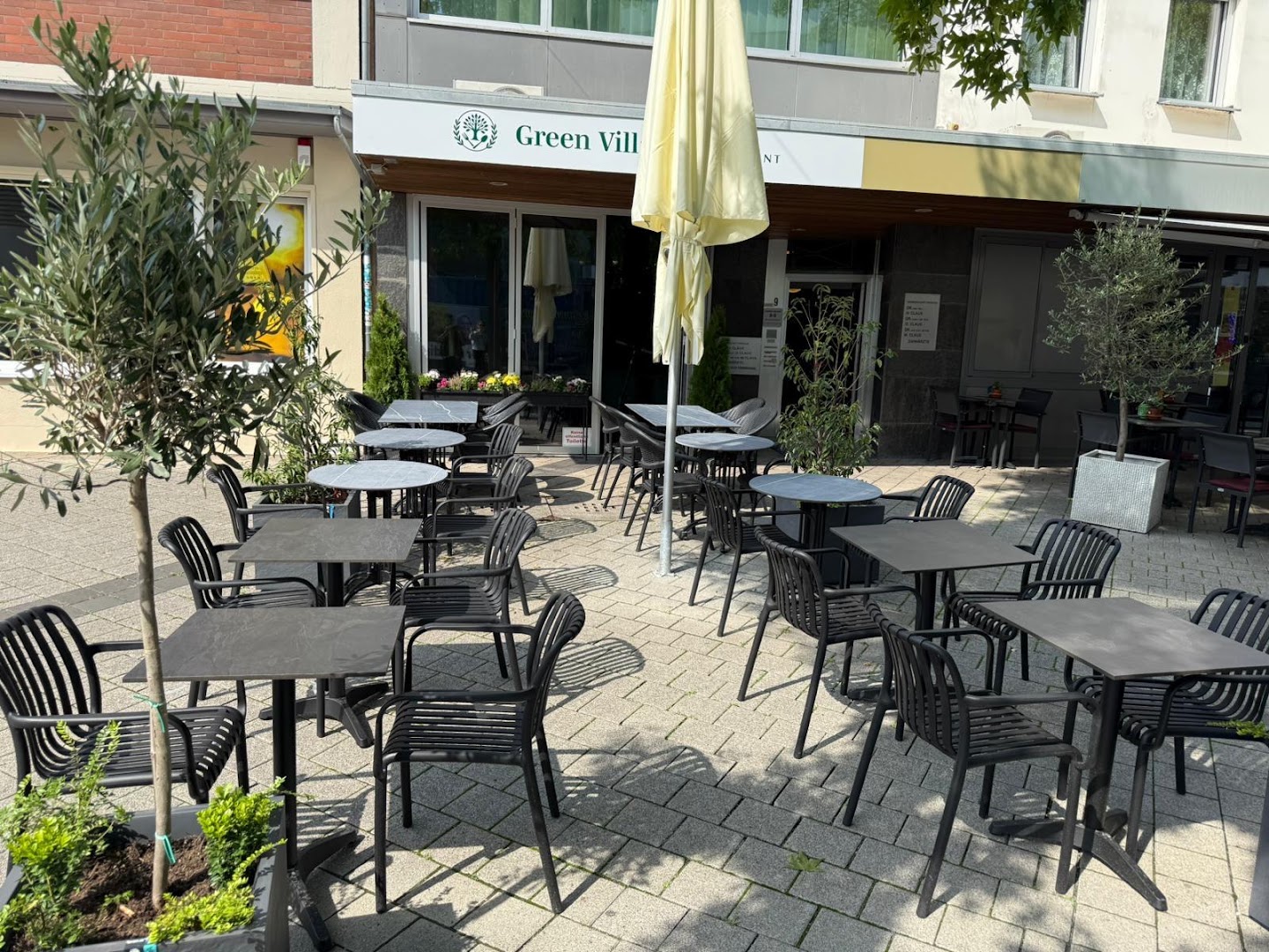 Green Village: clear photo of restaurant terrace