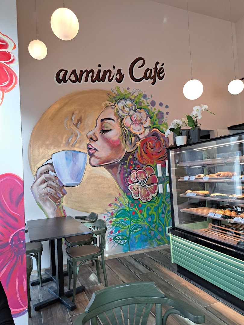 Asmin's Café und Bäckerei: attractive interior with brand signage