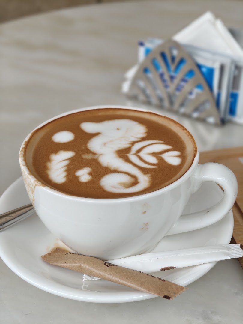 Kosta Coffee: high quality latte art photo