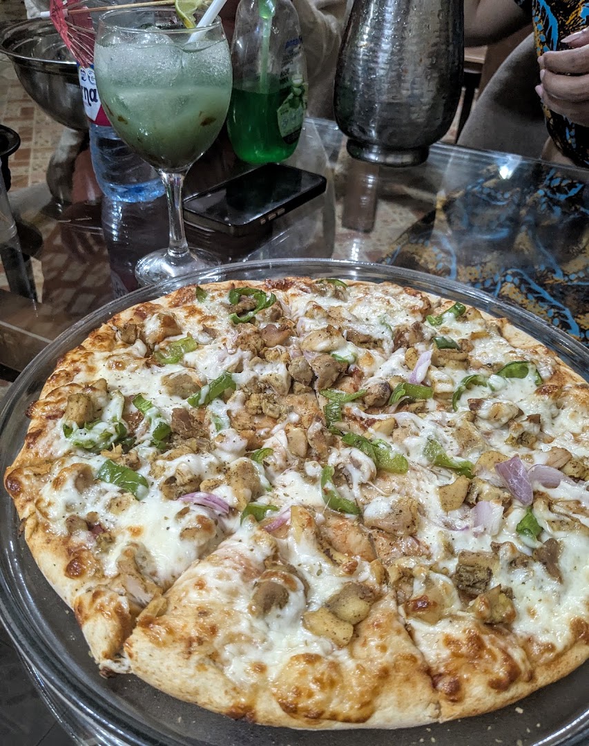 Tacorabama Pizza House: appetizing photo of restaurant food
