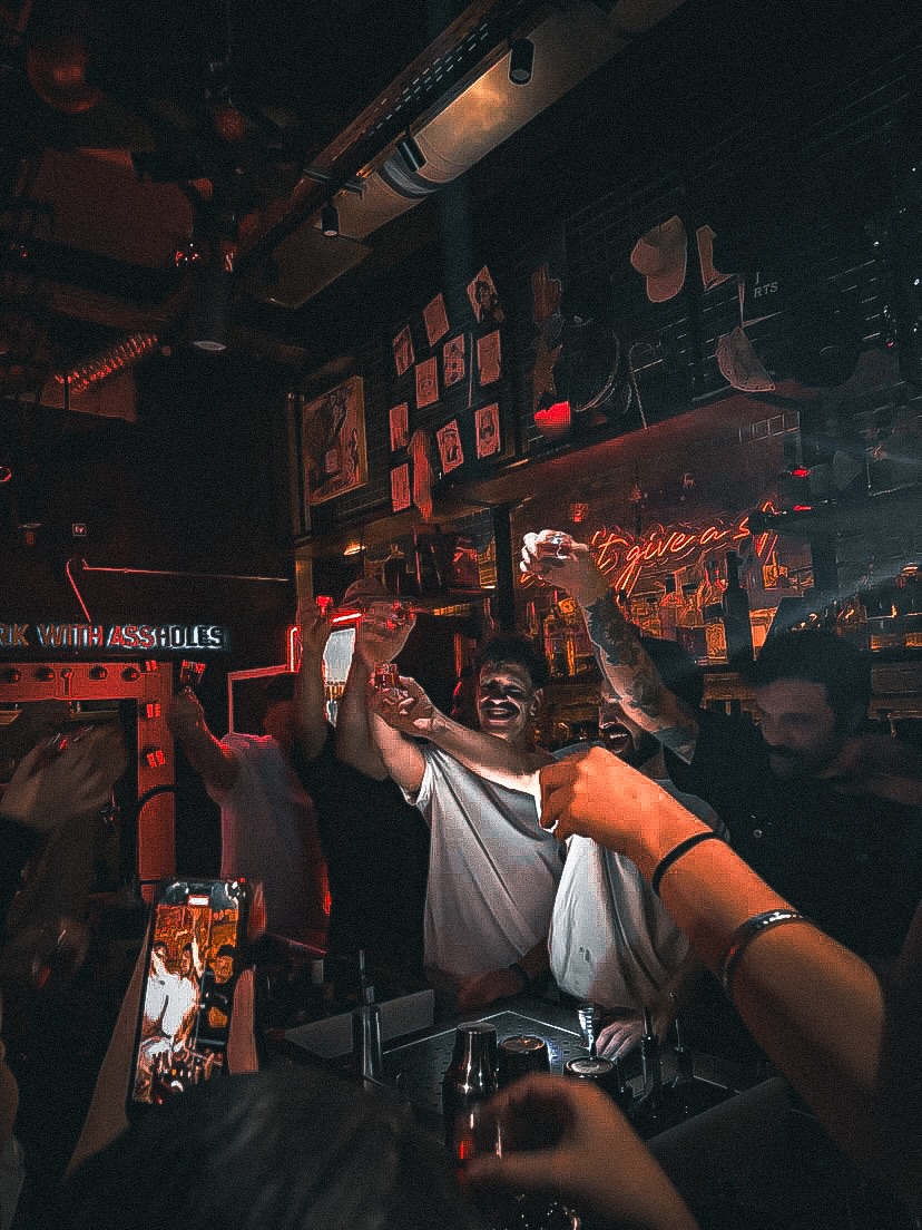 Sips and Sins: vibrant bar atmosphere well