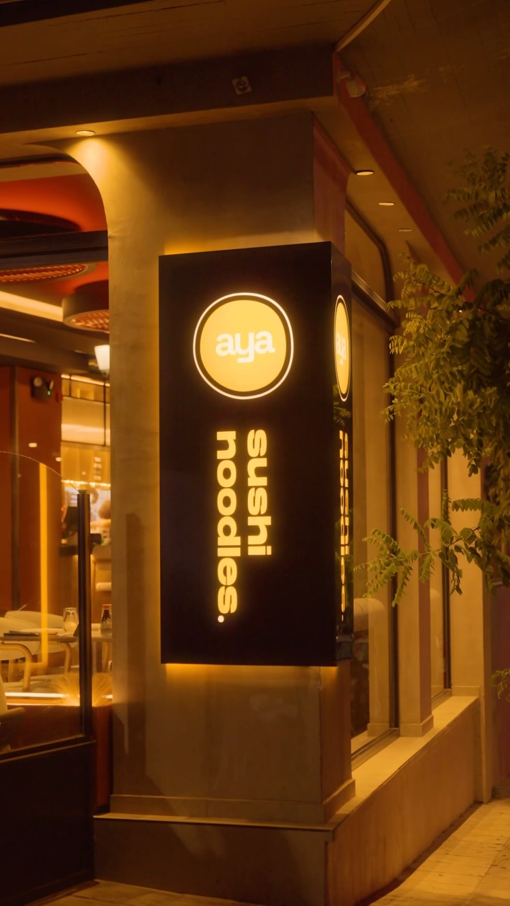 Sushi Bar & Noodles Aya: professional shot of restaurant signage