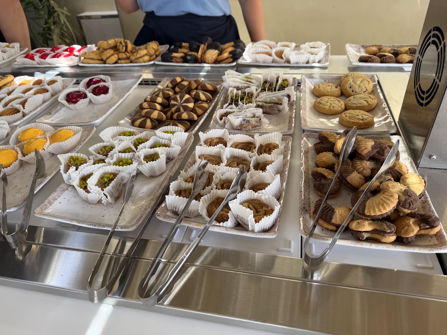 Royal Beach Club Santorini: appetizing display of fresh pastries