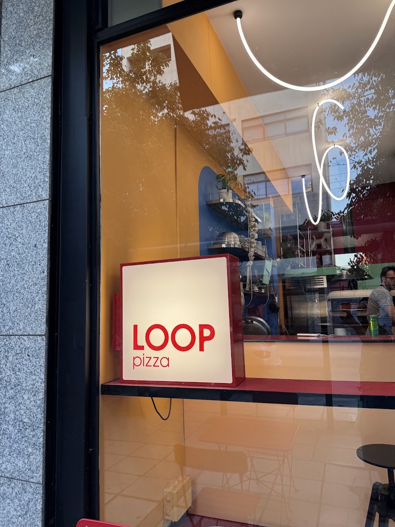 Loop Pizza: clear, professional shot of storefront