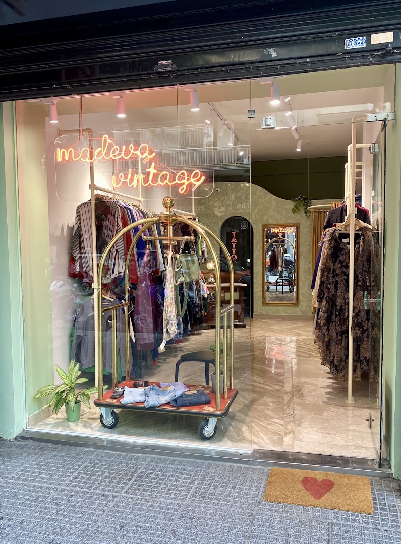 Modeva Vintage: clear, inviting storefront photo