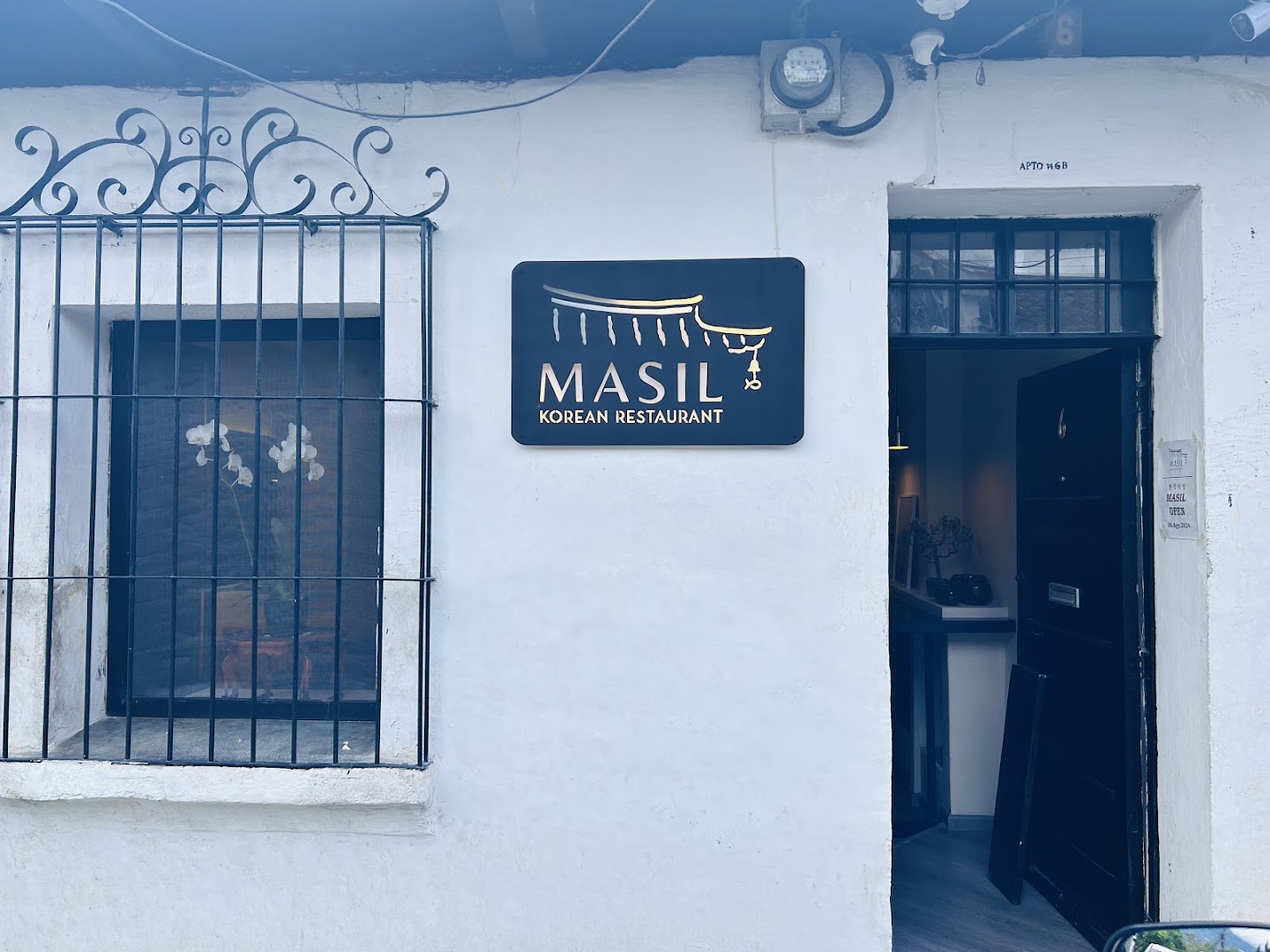 Masil: clear, professional exterior restaurant shot