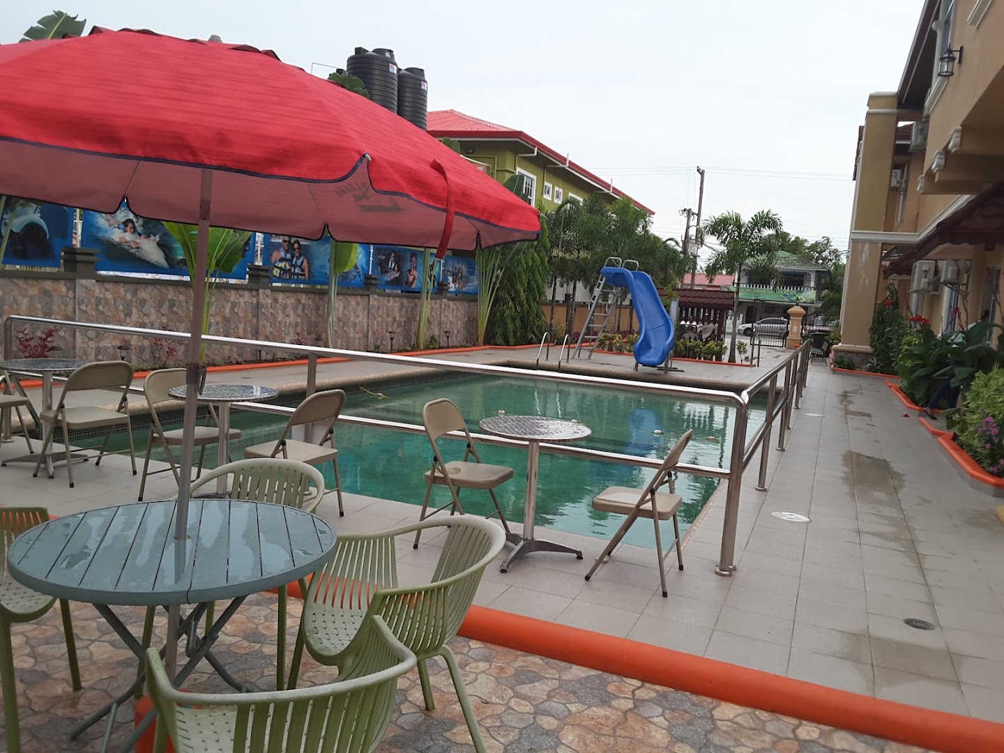 Palm Spring Hotel Restaurant & Bar: hotel pool and seating