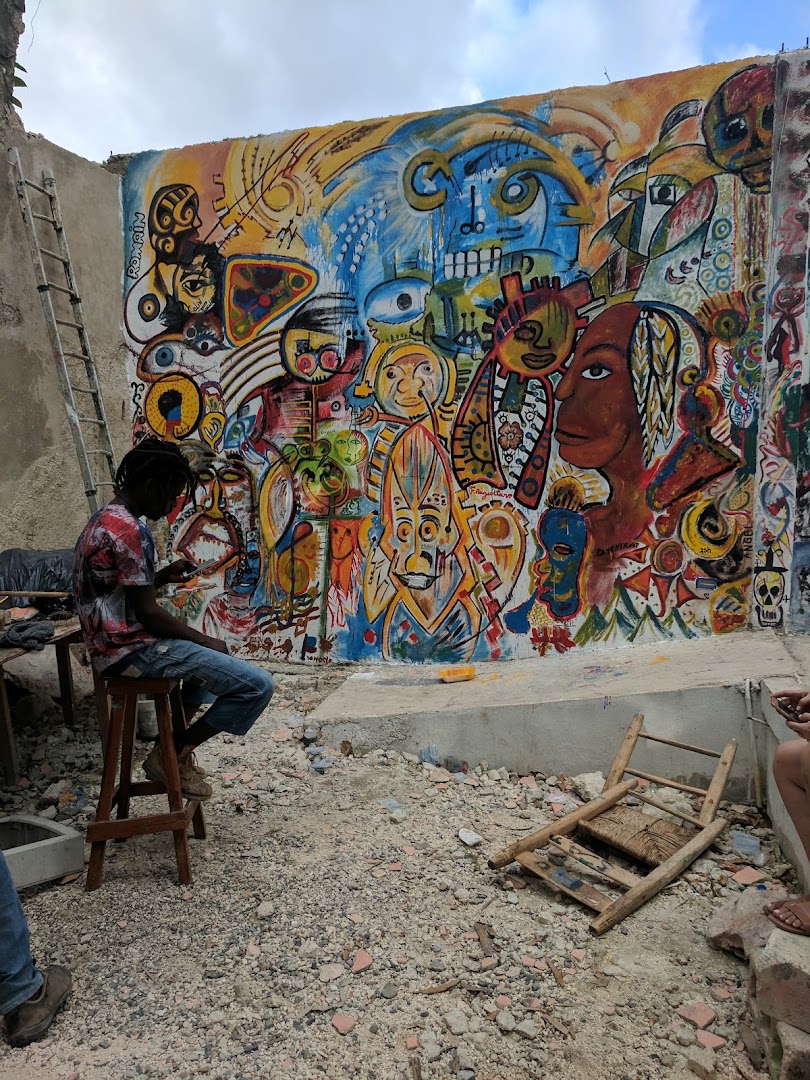 Jacmel Arts Center: artist creating mural art