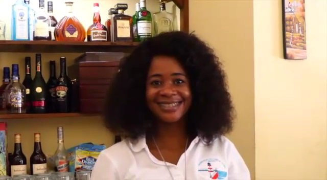 L'Auberge du Vieux Port: friendly staff member at bar