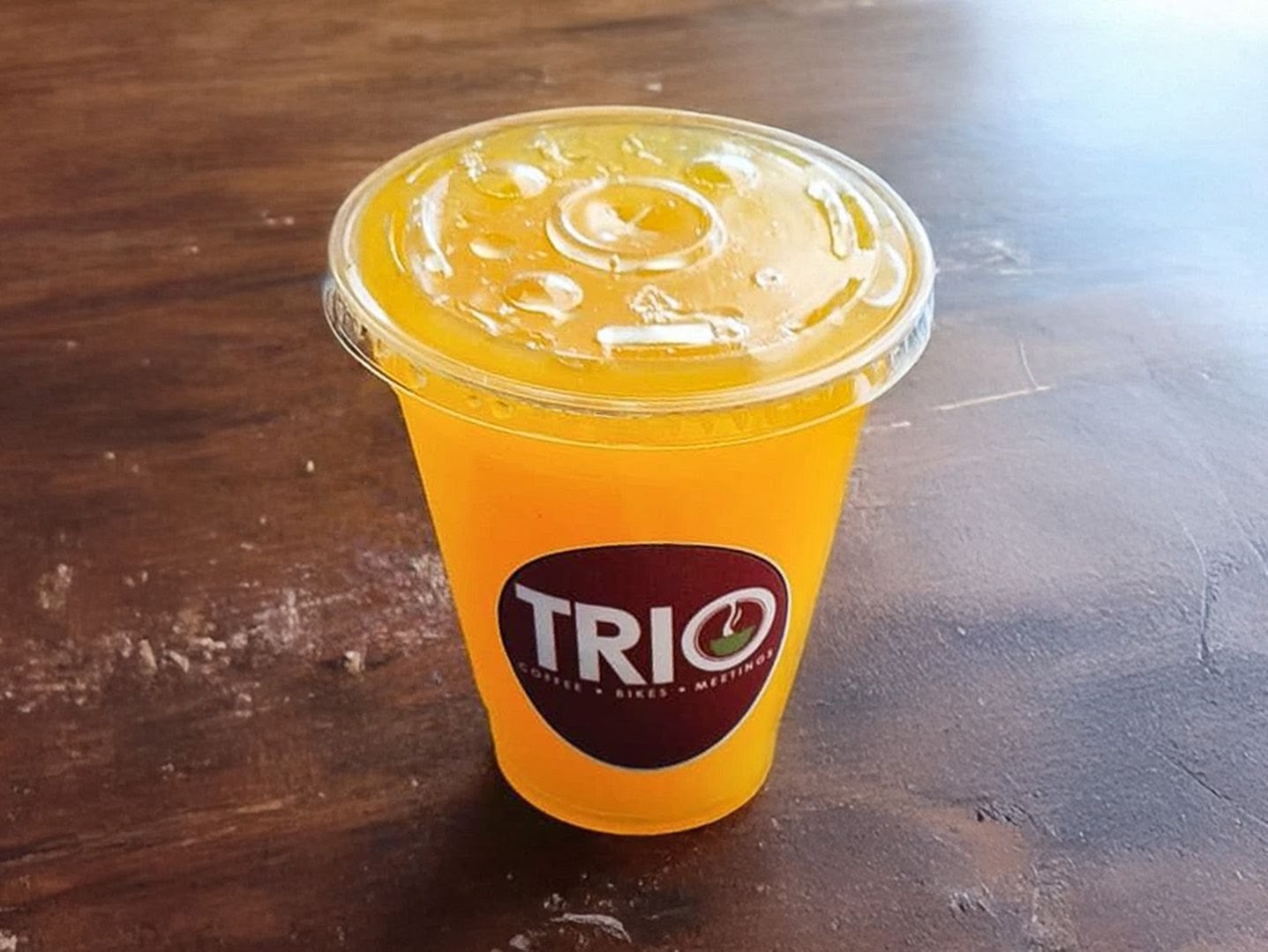 Trio Coffee-Bikes-Meetings: clear photo of branded drink