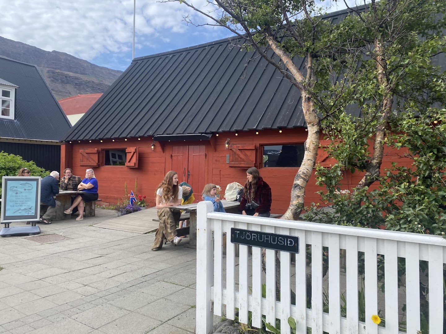Tjöruhúsið: inviting exterior with restaurant atmosphere