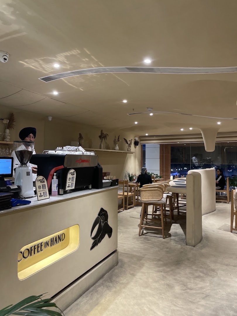 Coffee in Hand: clear, professional interior shot