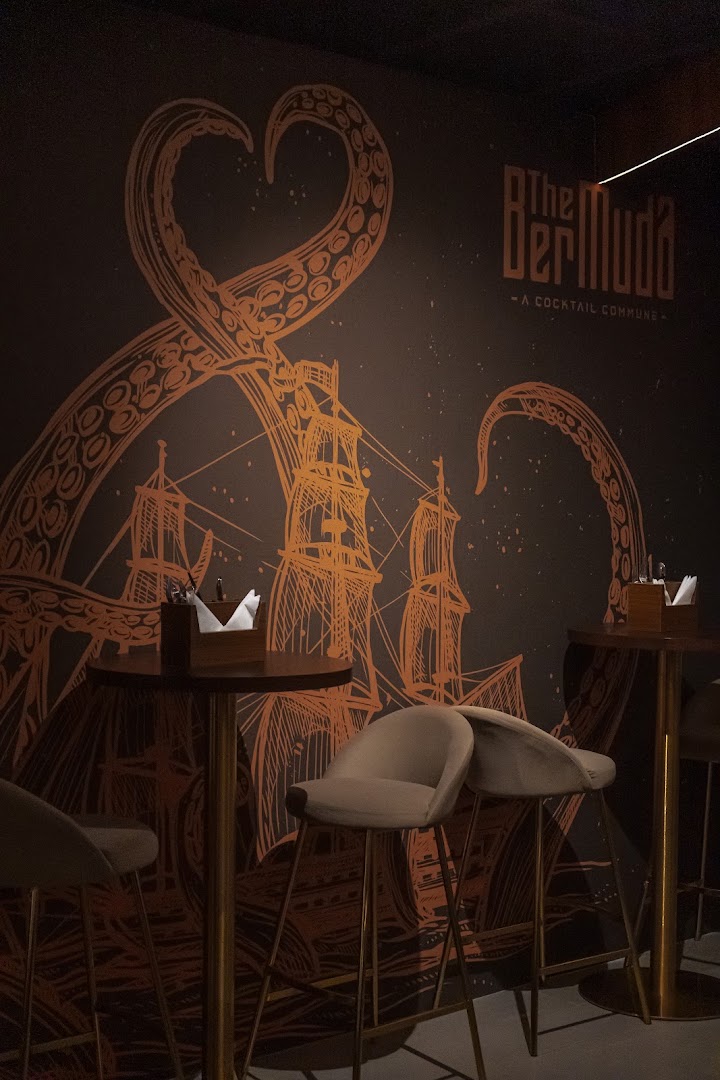 The Bermuda, A Cocktail Commune: atmospheric interior with clear branding