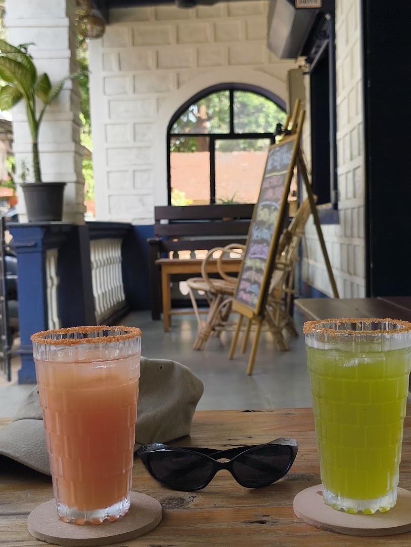 The Feni House and Taberna: inviting atmosphere with drinks displayed
