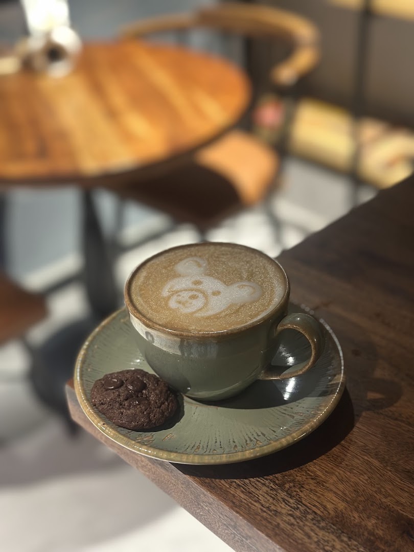 CAVA: appealing coffee and cookie photo