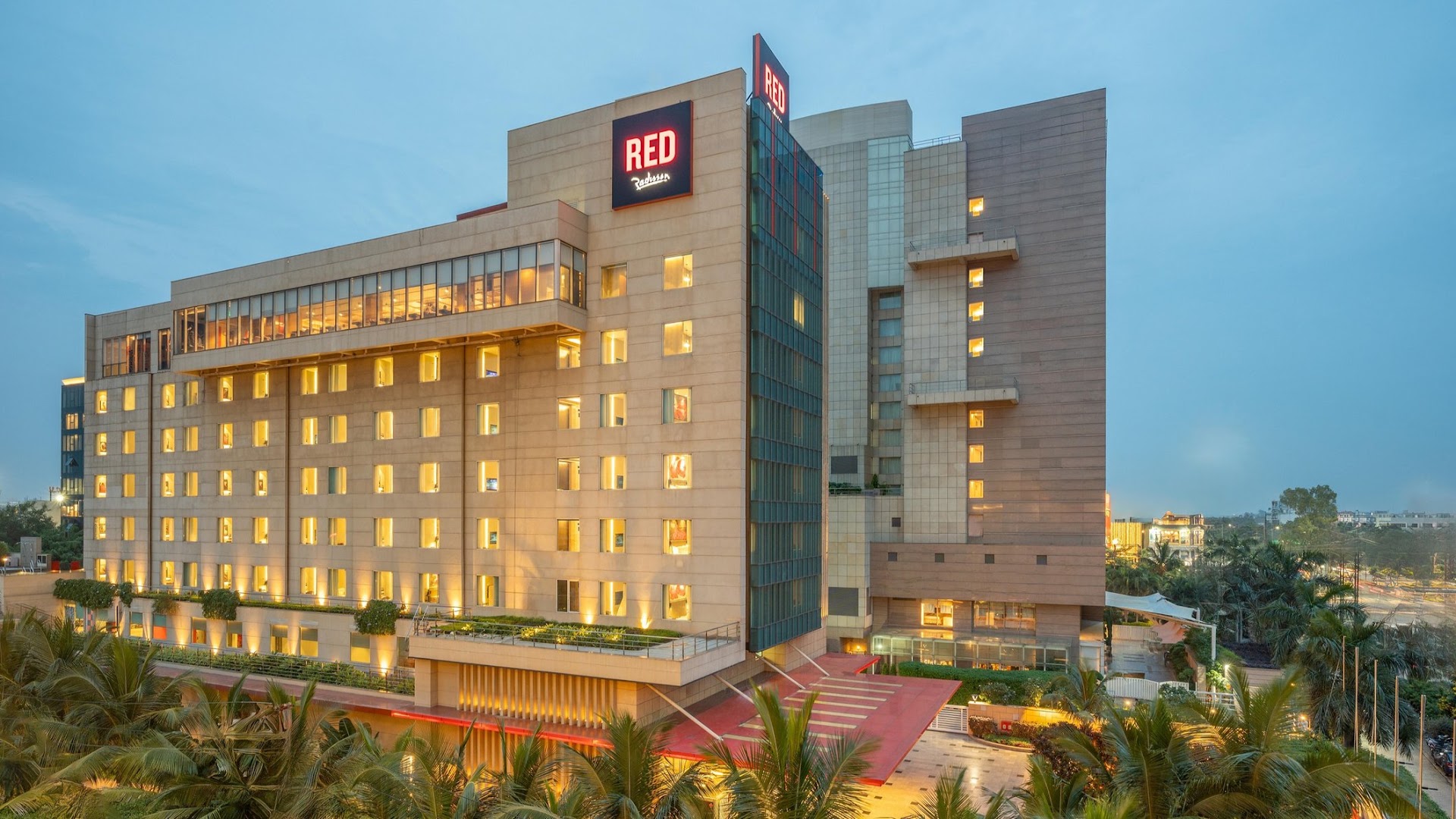 Radisson RED Indore: professional exterior hotel shot