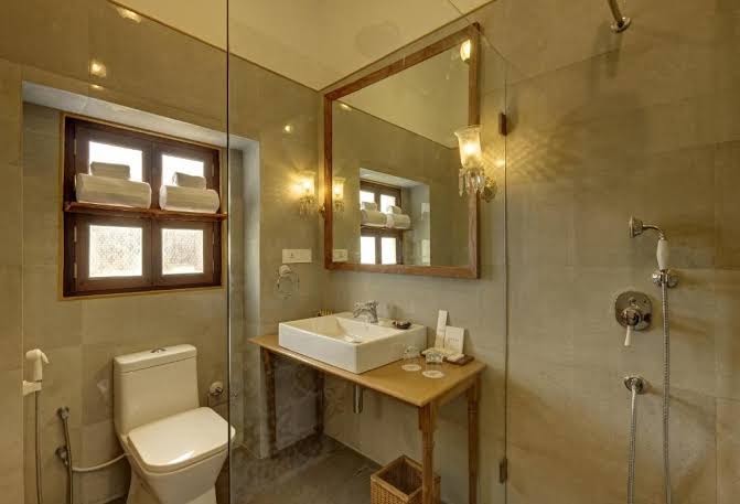Saraca Hotel Lucknow: clean professional hotel bathroom photo