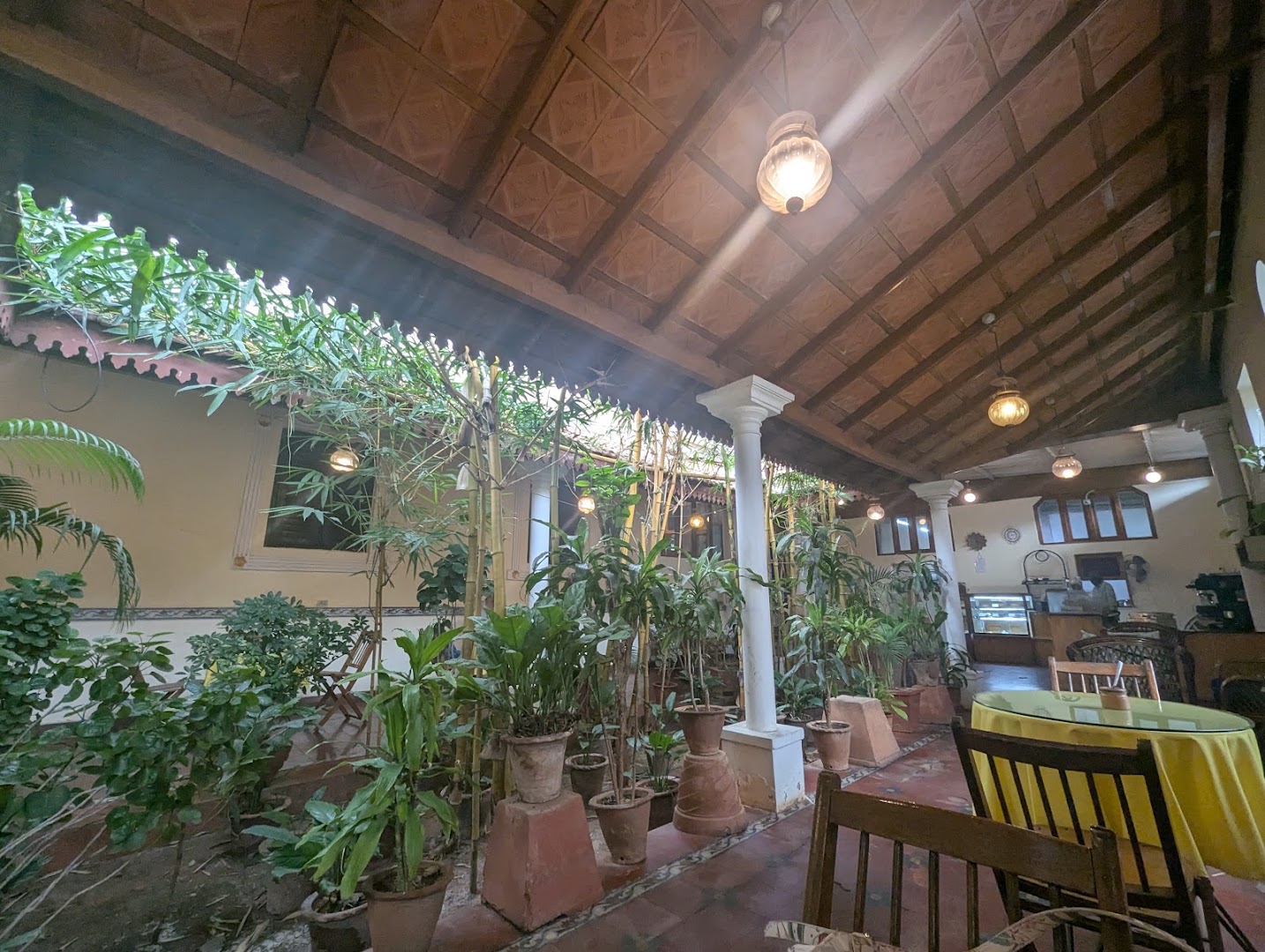 Malgudi Coffee Shop & Bakery: inviting and well-lit interior atmosphere