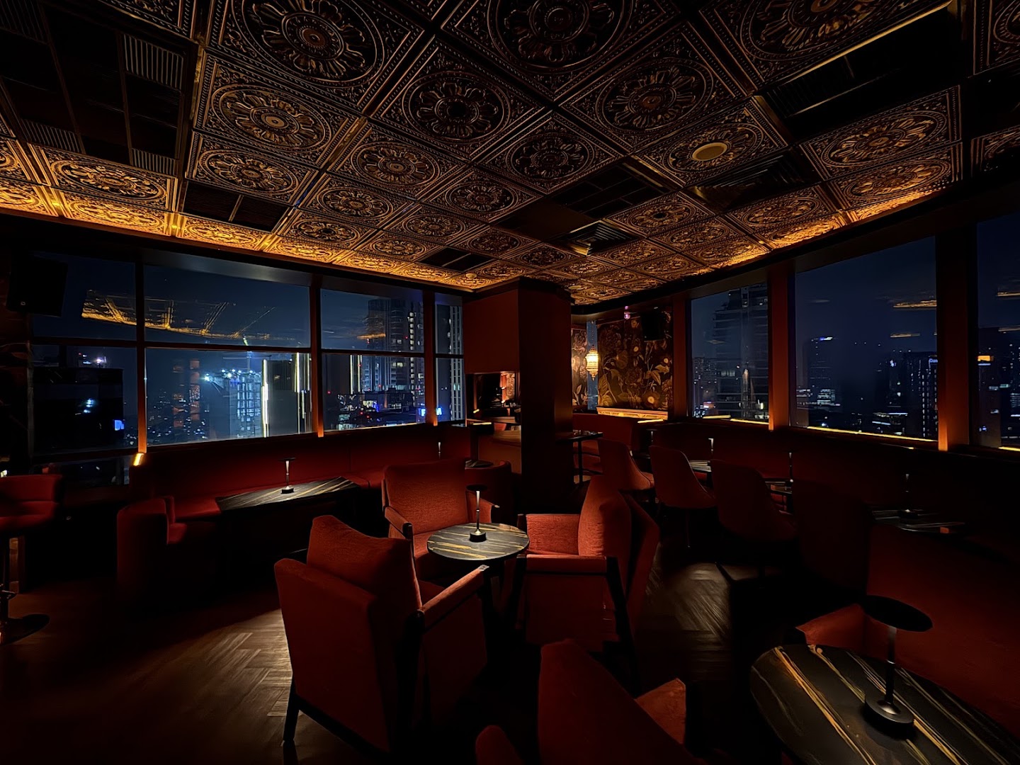 Vagabond: atmospheric interior with city view