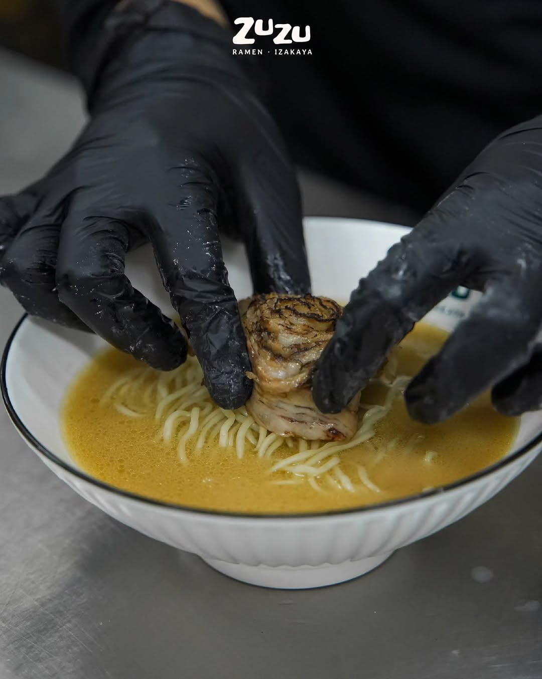 Zuzu Ramen Izakaya: professional food preparation shot