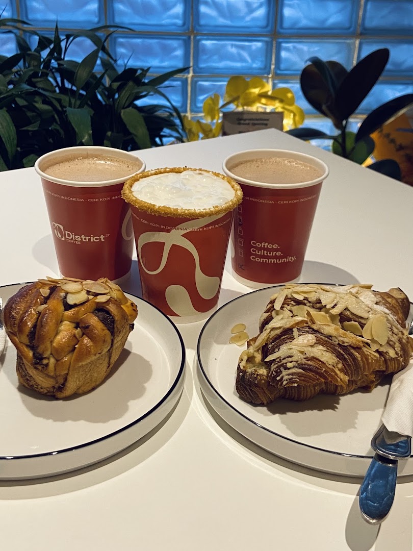 District 27 Coffee: appetizing photo of coffee and pastries