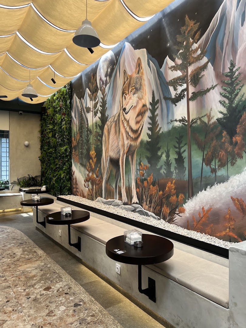 The Lone Wolf Cafe & Resto: attractive interior with unique mural