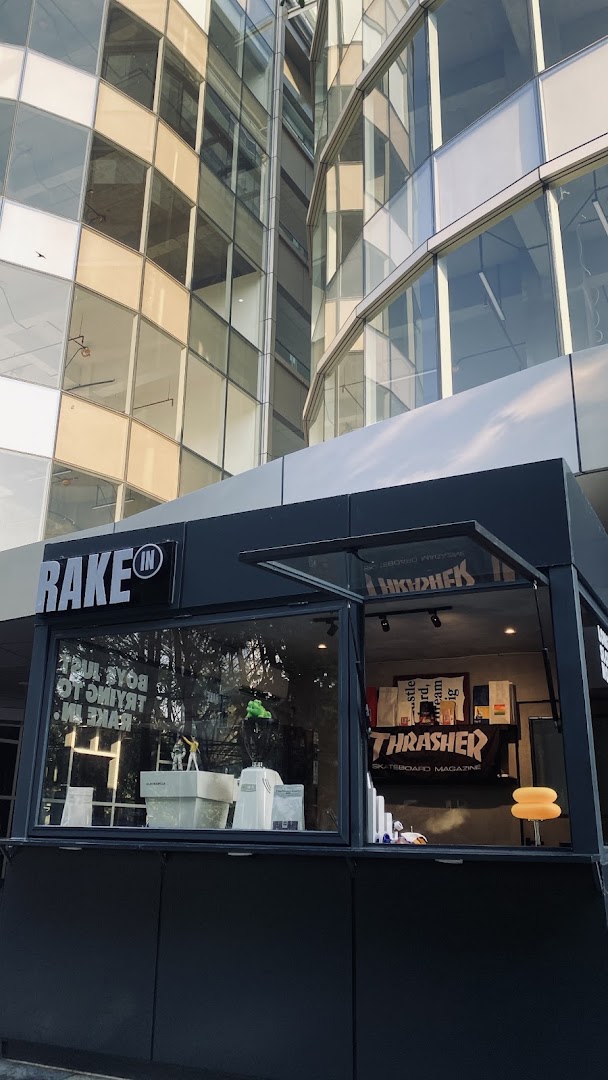 Rake In: clear exterior shot of venue