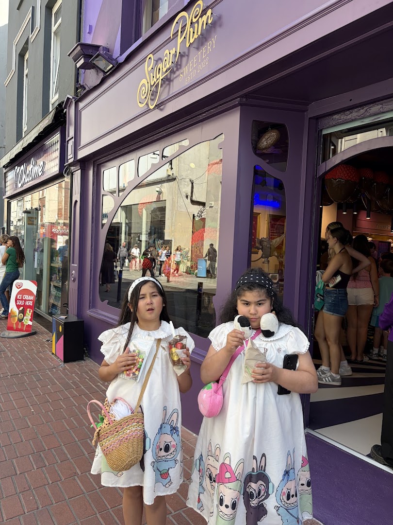 Sugar Plum Sweetery: storefront and happy customers