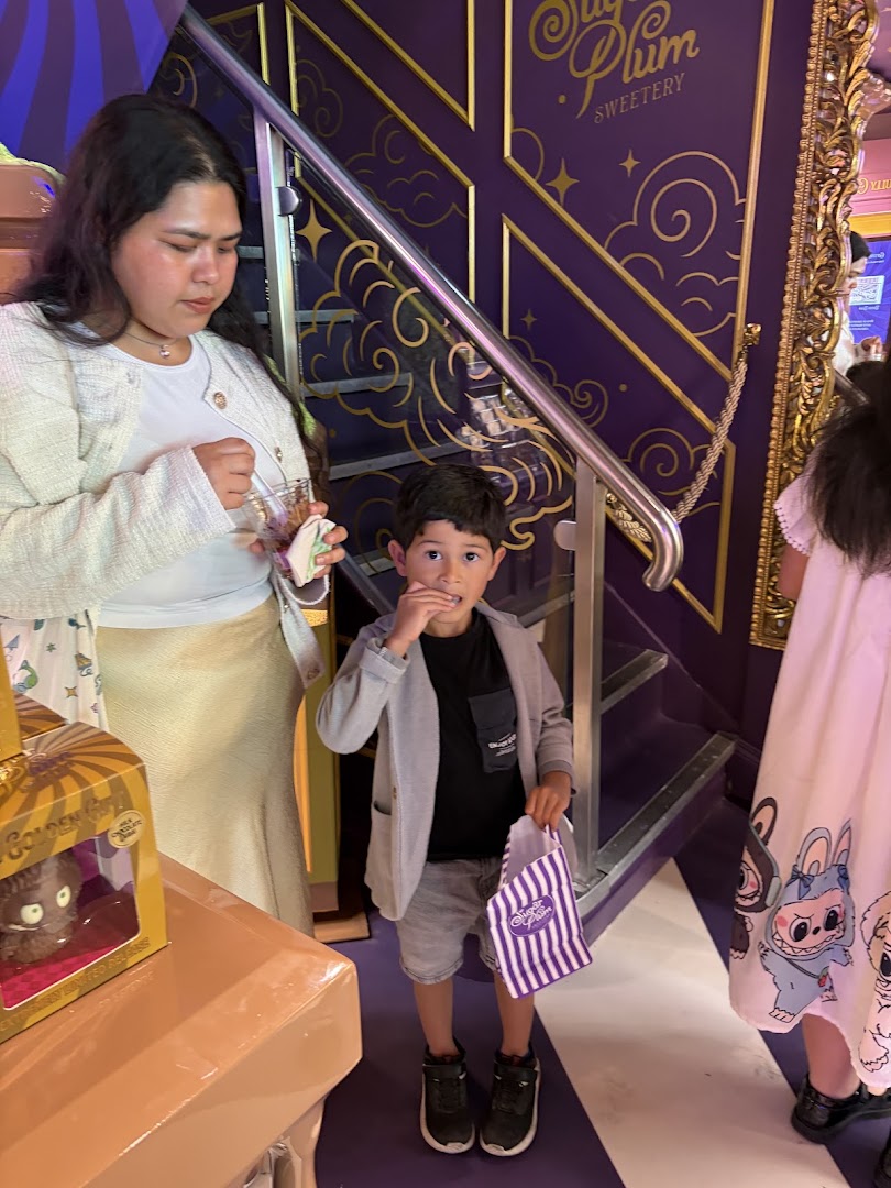Sugar Plum Sweetery: customers enjoying the shop