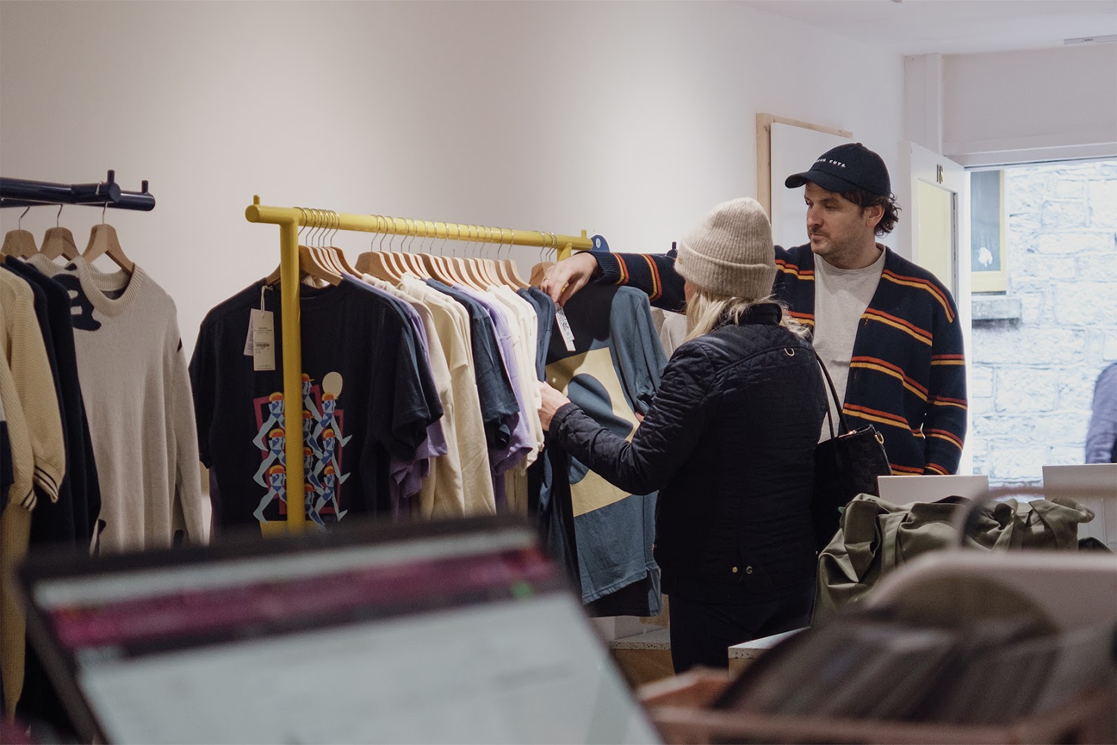 Fresh Cuts Clothing: customers browsing shop products