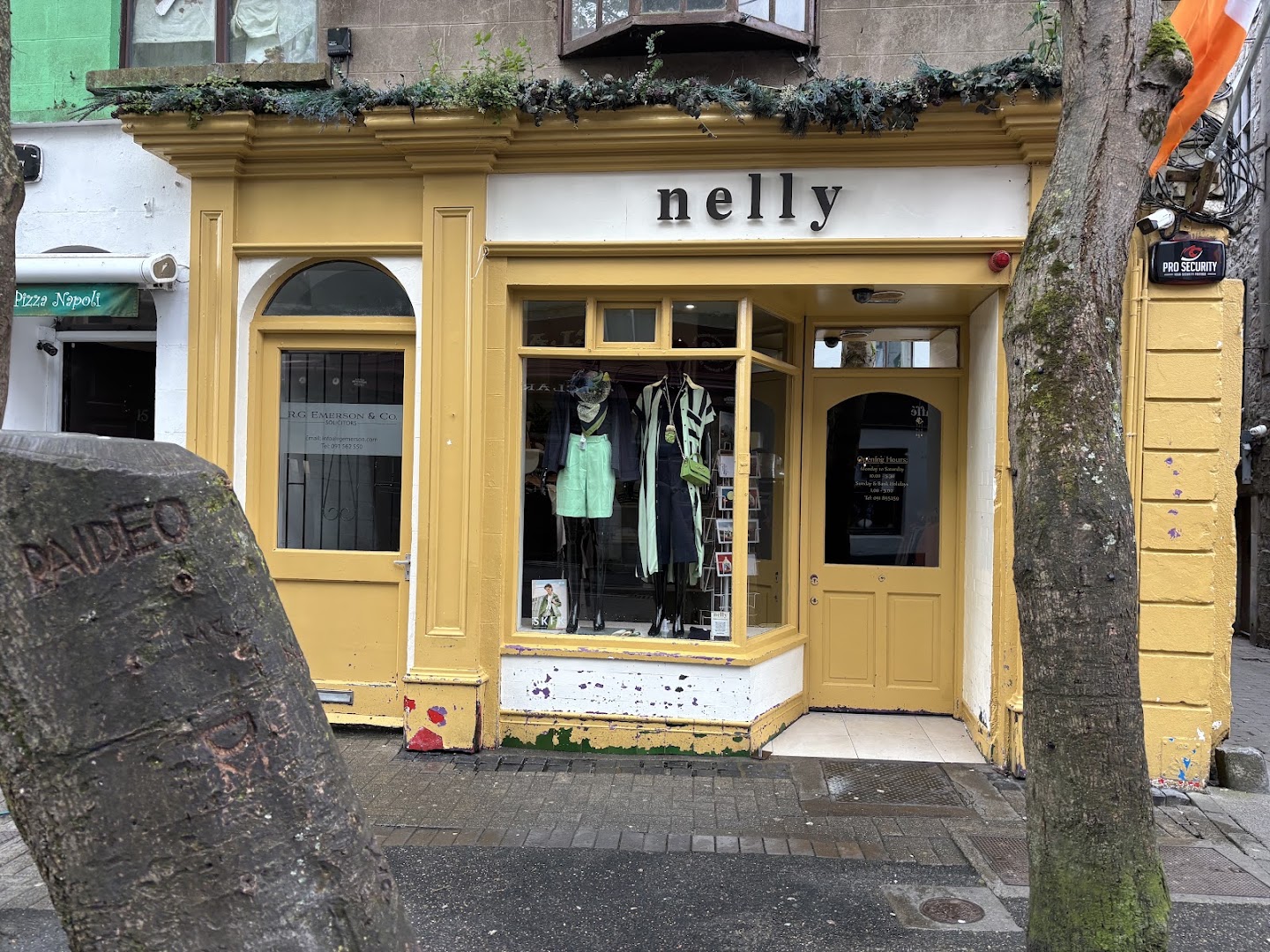 Nelly: clear storefront photo of shop