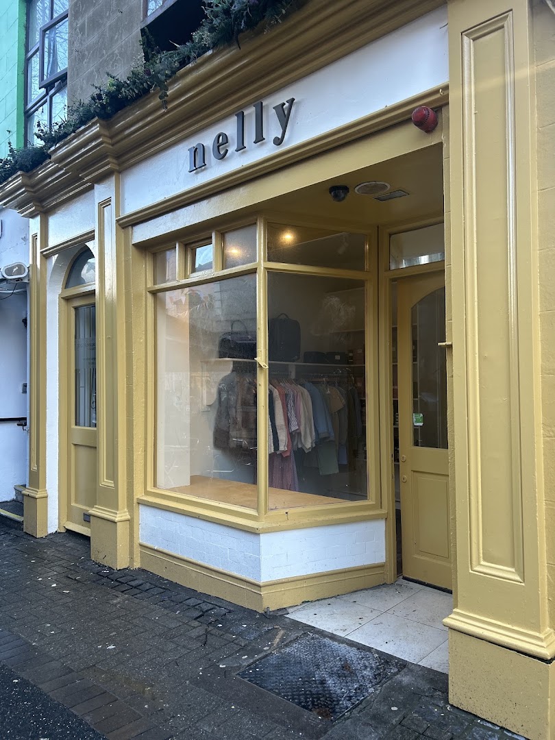 Nelly: clear storefront photo of shop