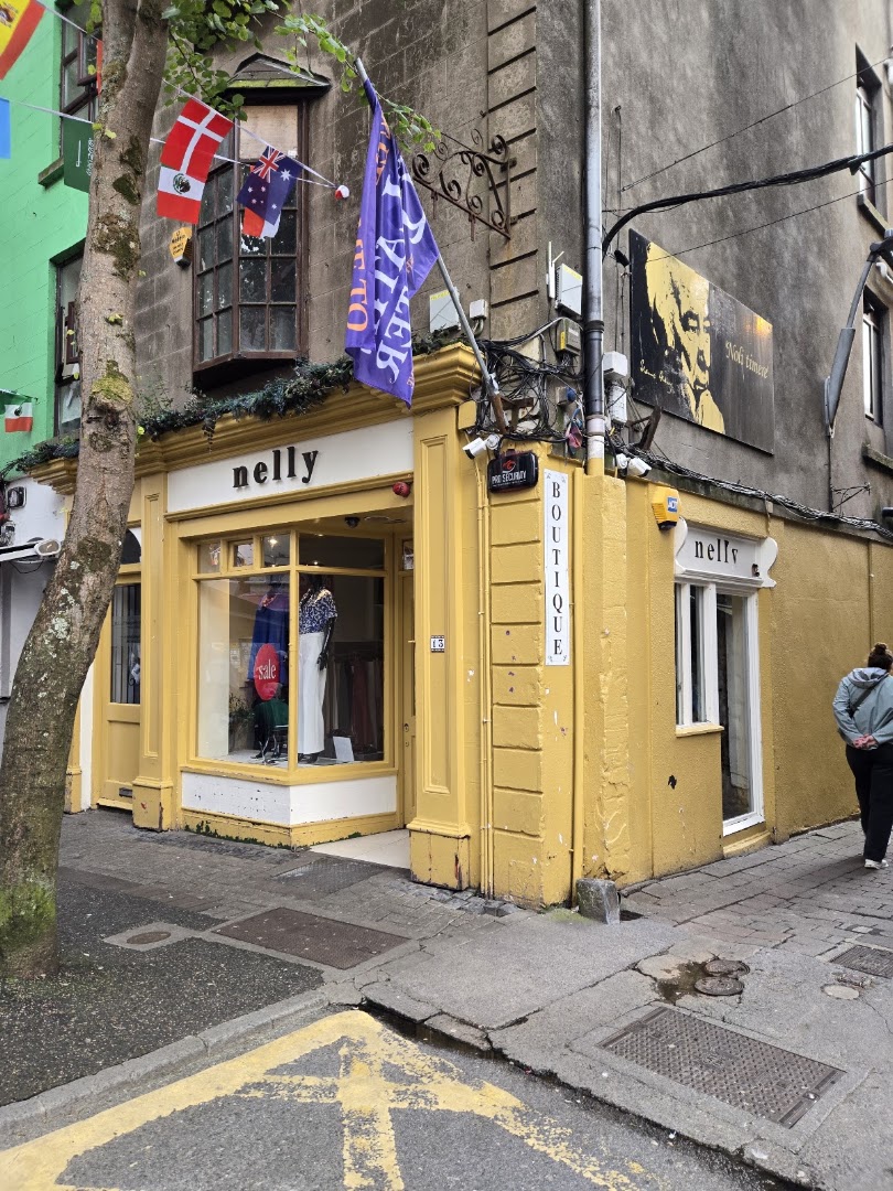 Nelly: clear storefront photo of shop