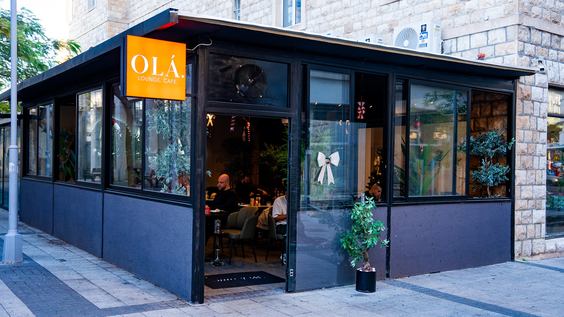 Ola Cafe: clear, professional exterior venue shot